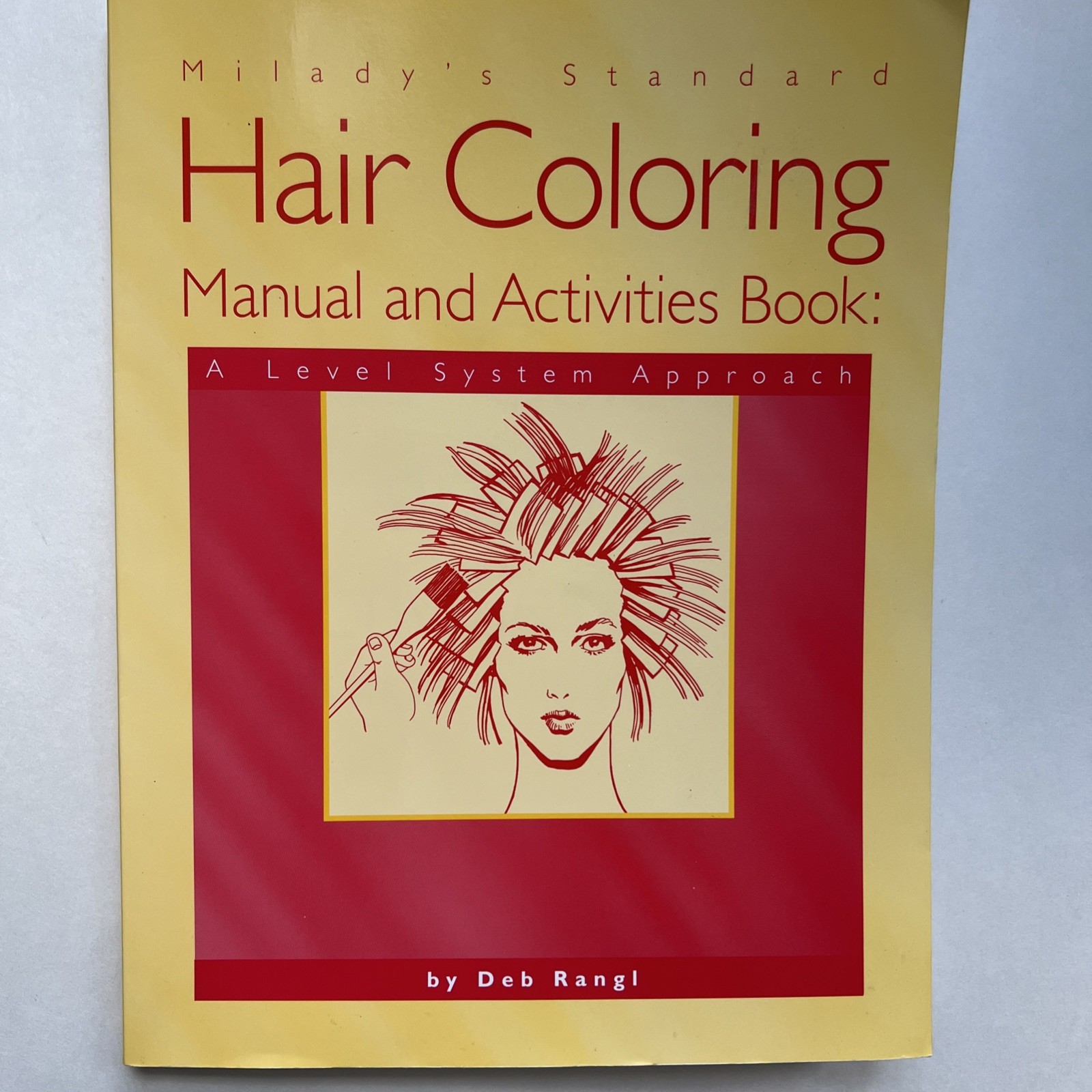 Milady’s Standard Hair Coloring Manual and Activities Book: A Level System A…